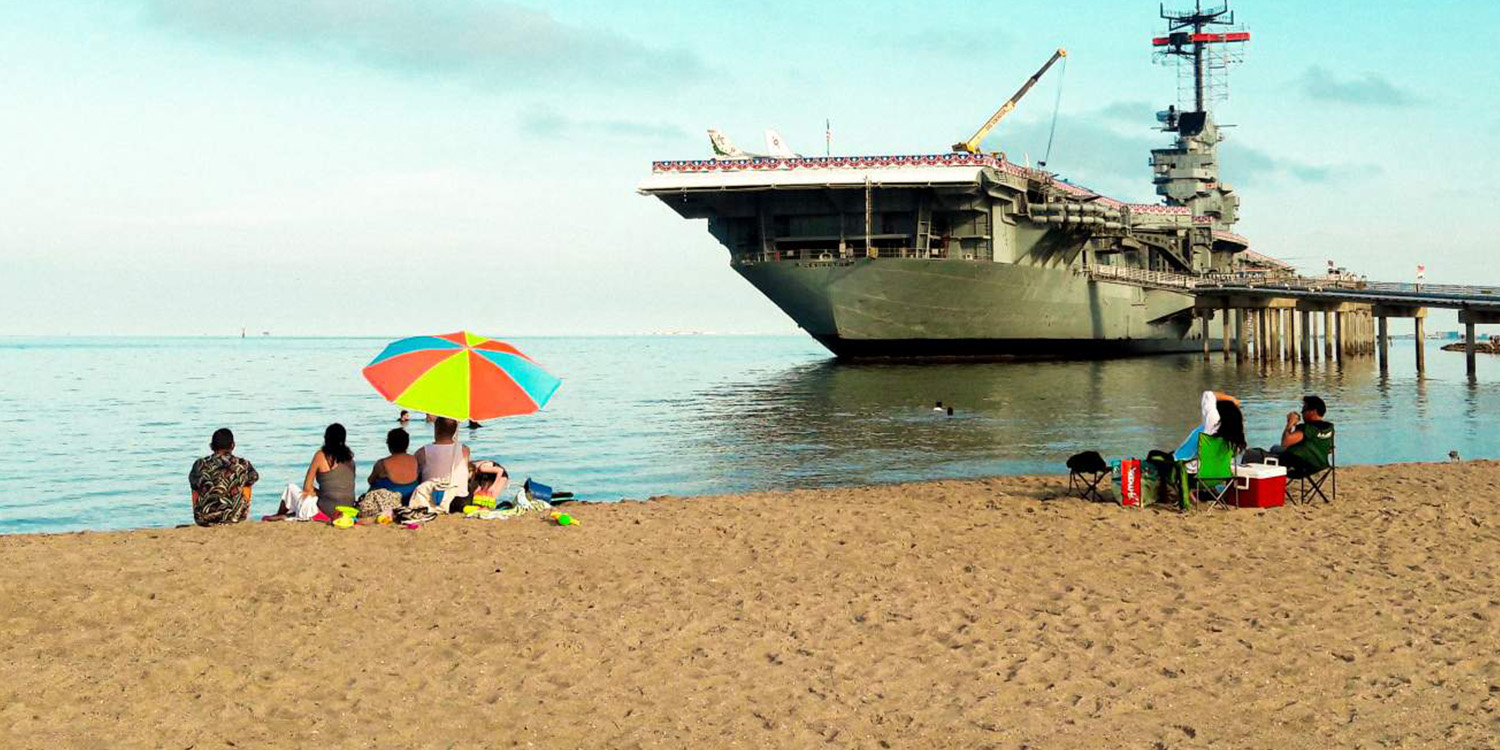 Photo of North Beach sand and families